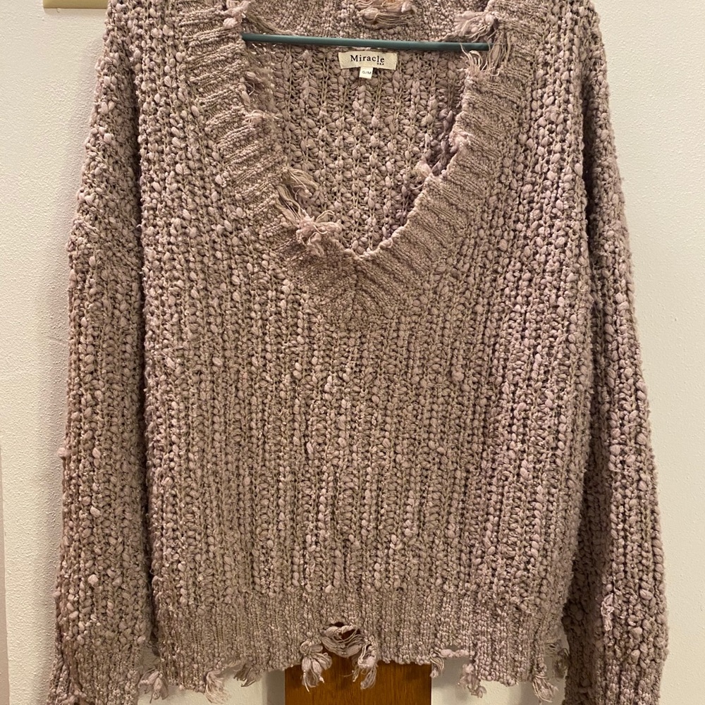 Size S/M distressed sweater